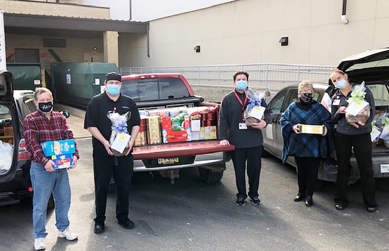 Owners of A Flower Basket in Bellefonte deliver donations News